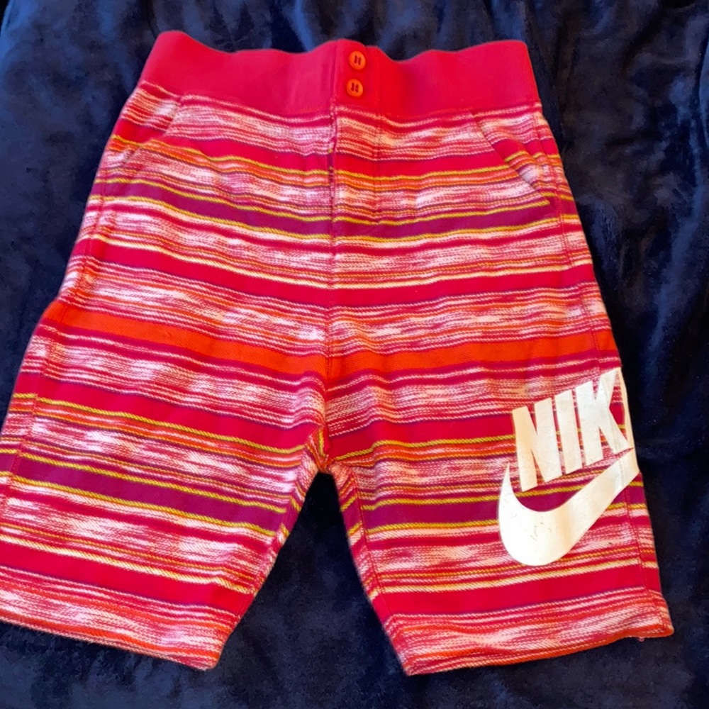 Nike multi color shorts retro look men size small women can wear them too.